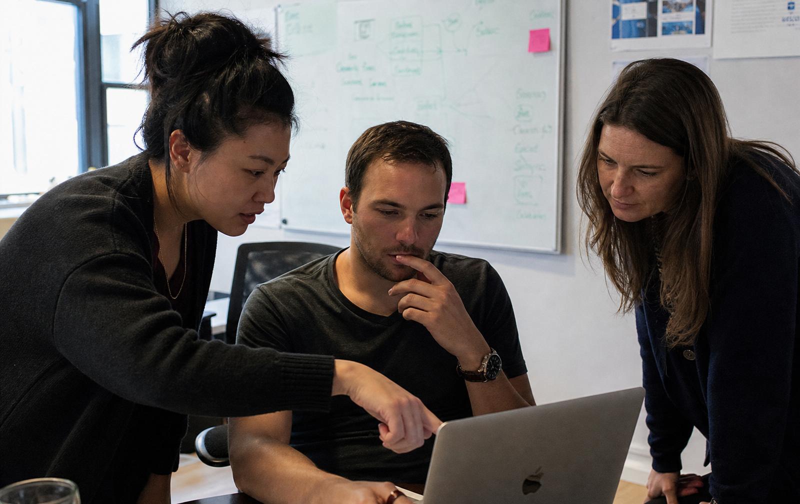 Marketing team reviewing performance analytics